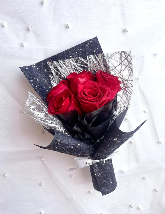 5 Stalks preserved red rose bouquet in black and silver wrapper