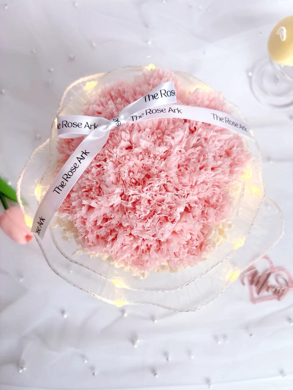 A bloom of preserved pink carnations