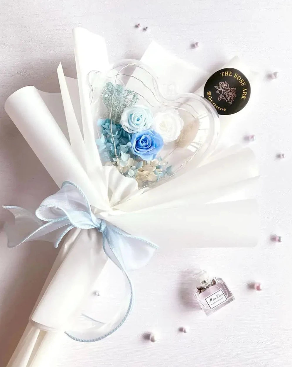 Preserved Blue and White Rose Bouquet with Heart in White Wrapper The Rose Ark